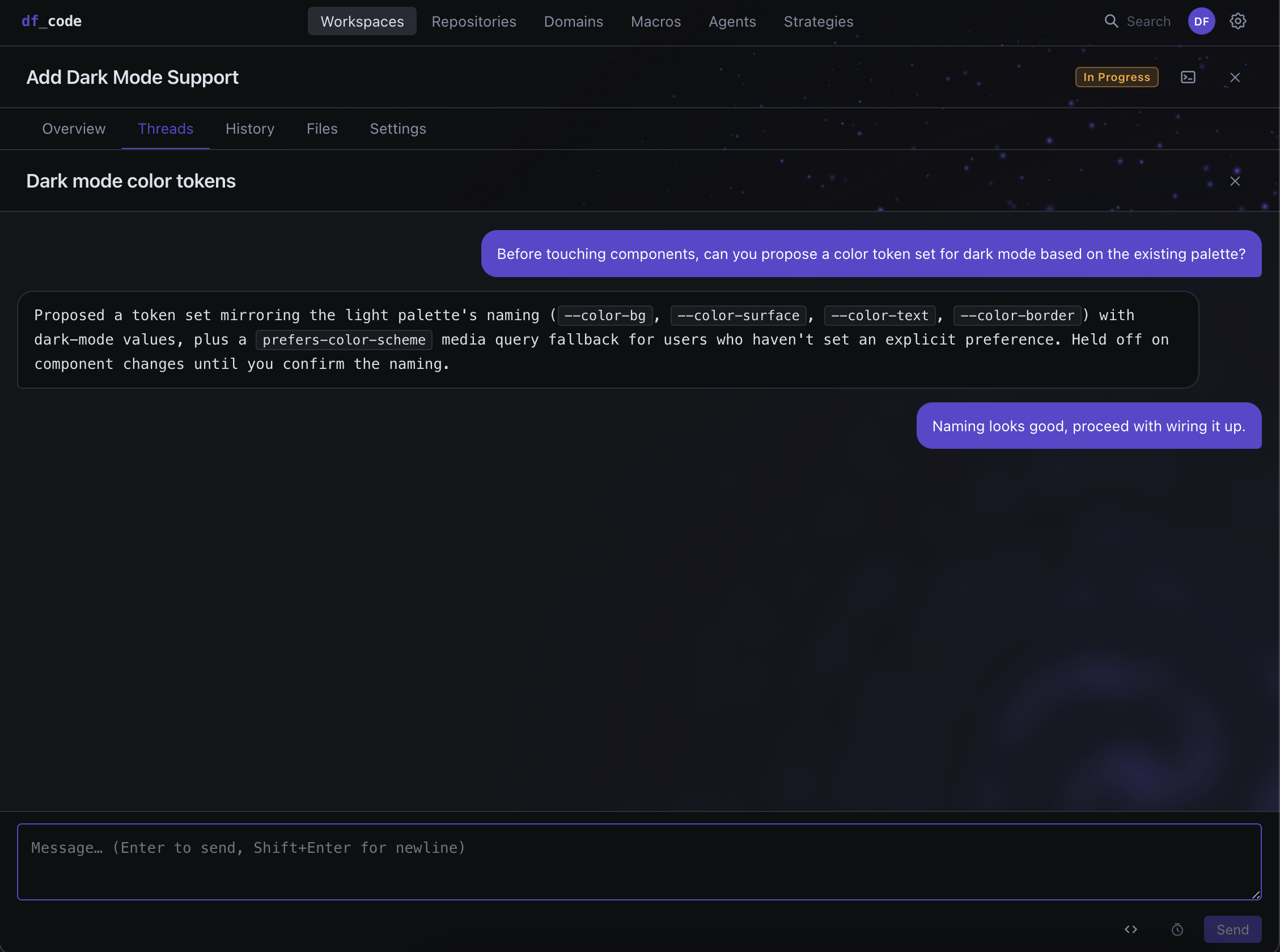 A workspace thread where an agent proposes a dark-mode color token set and holds off on further changes until the user confirms